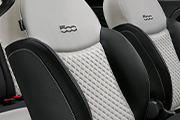 Dedicated black sand Matelassé fabric seats with techno leather details